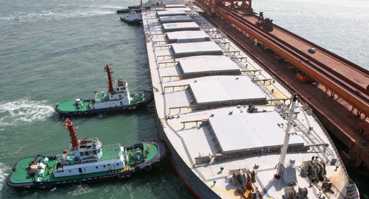 Cargo ship docked waiting to be loaded