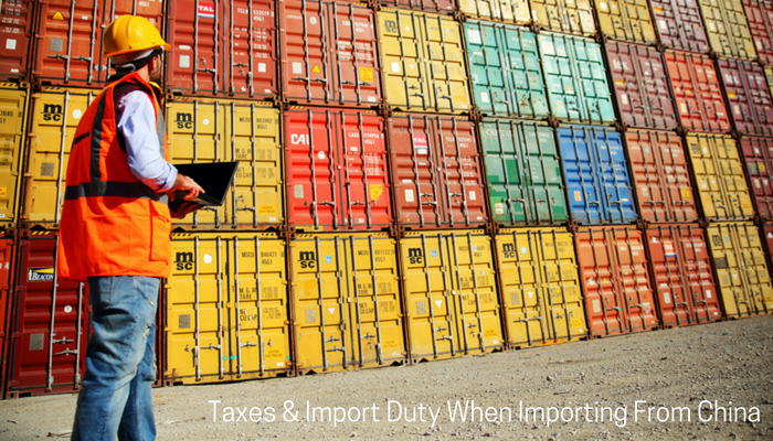 Man looking at shipping containers full of goods being imported from China into Australia